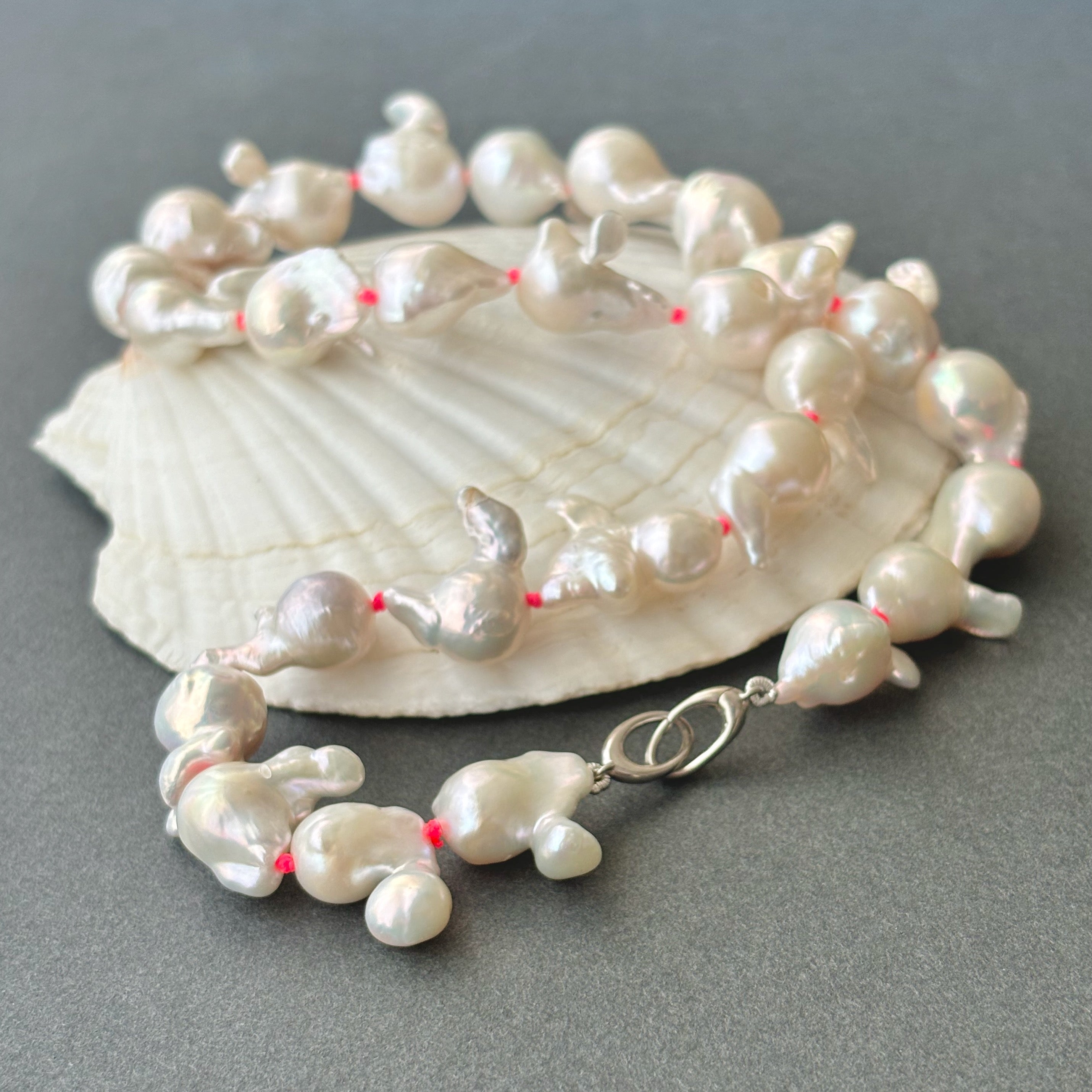 funky white freshwater pearls on neon pink knots– Kojima Pearl
