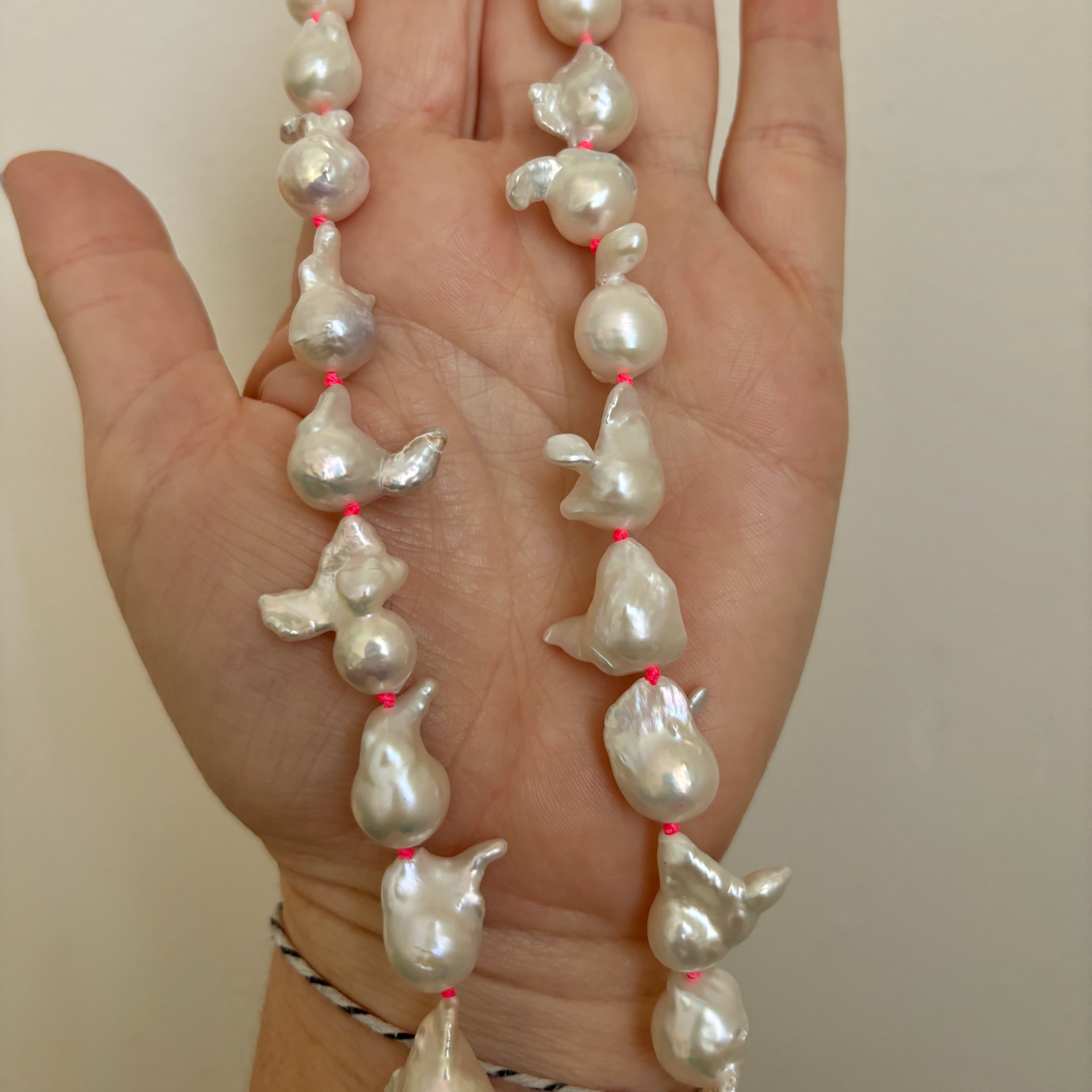 funky white freshwater pearls on neon pink knots– Kojima Pearl