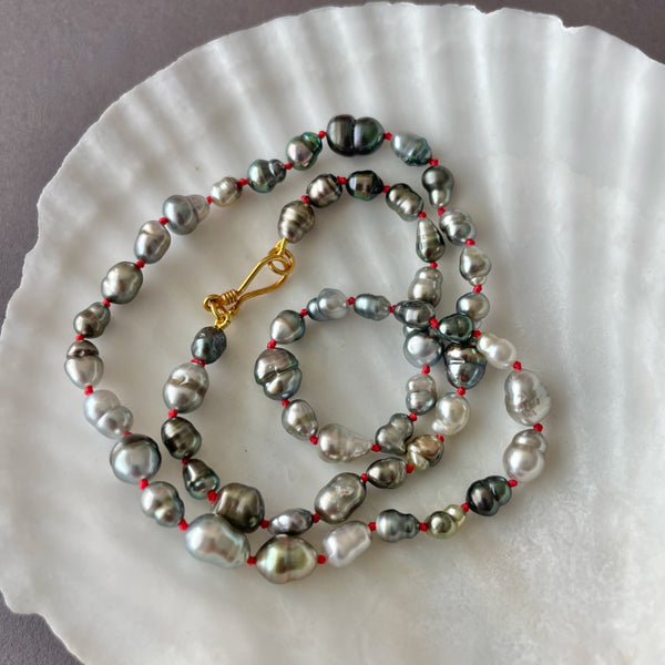 brilliant Tahitian keshi pearls on lucky red knots and 18K yellow gold clasp