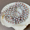 rope of silver pearls on lucky red knots