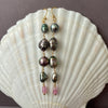 long fancy color Tahitian pearl and sapphire earrings