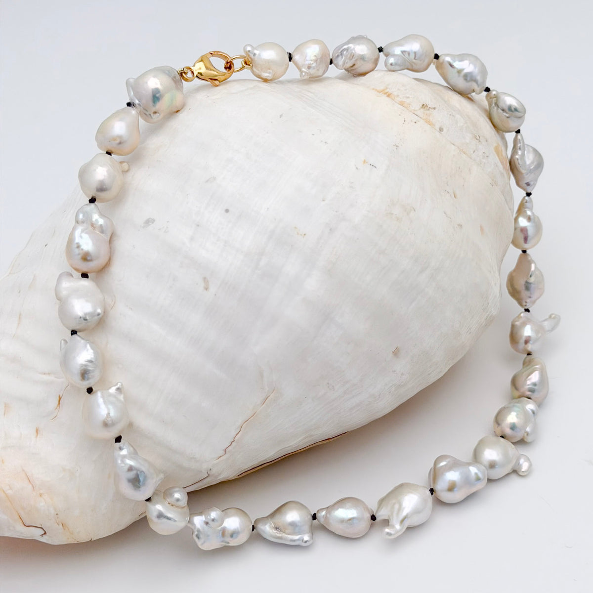funky white freshwater pearls on dark grey knots– Kojima Pearl