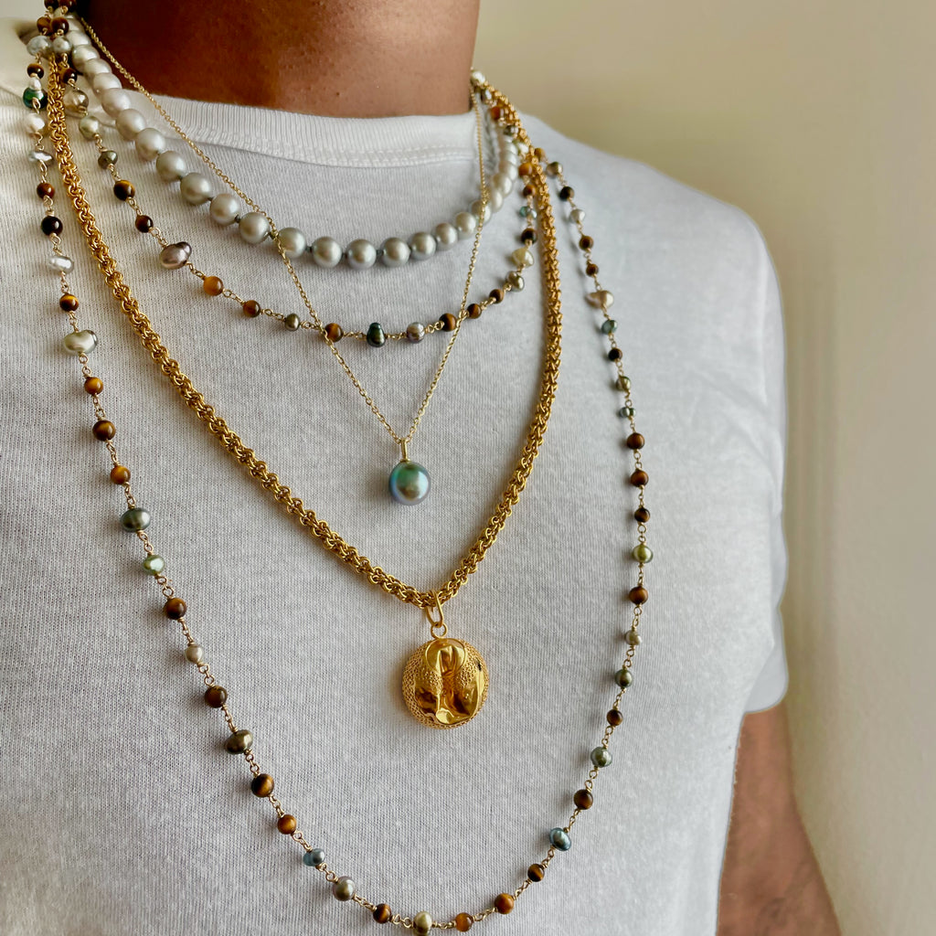 eye of the tahitian tiger wrapped pearl rope - pre loved pearls