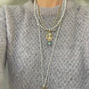 little silver fresh water pearls on deep grey knots necklace