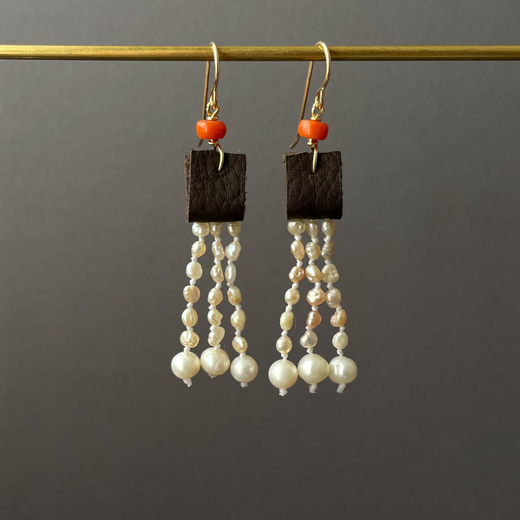 leather and coral pearl dangle earrings