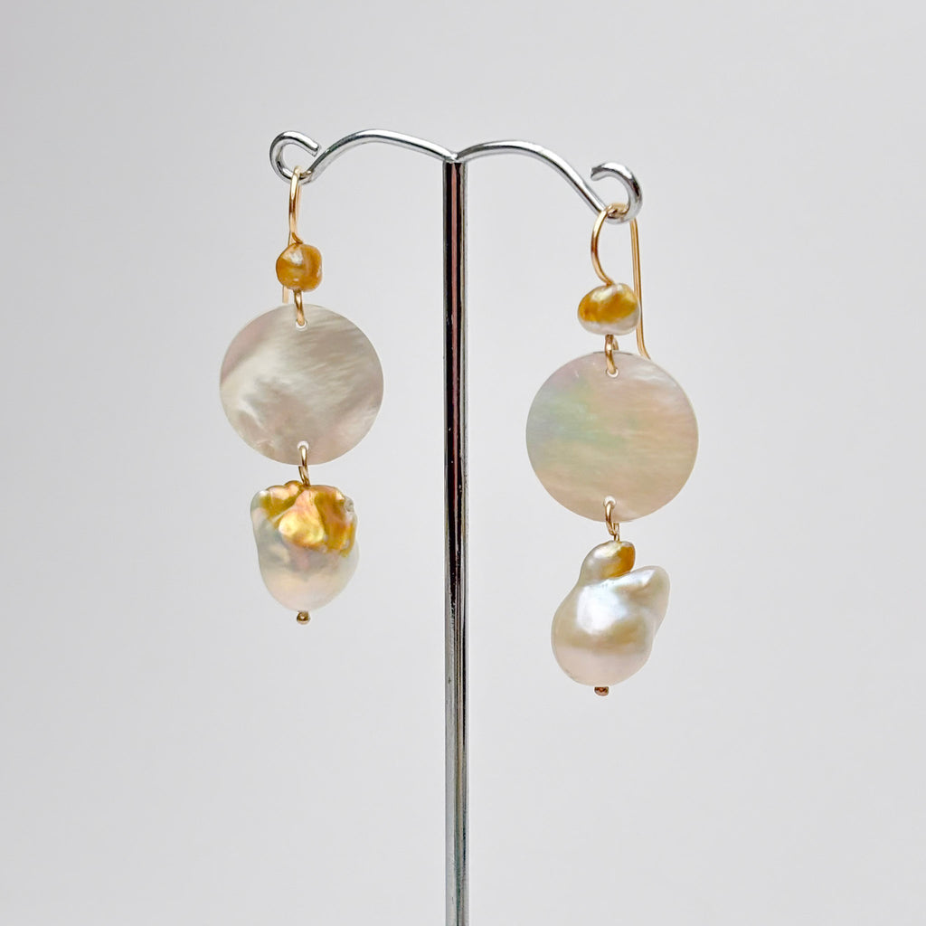 mother of pearl discs and fresh water pearls with golden areas by kojima pearl