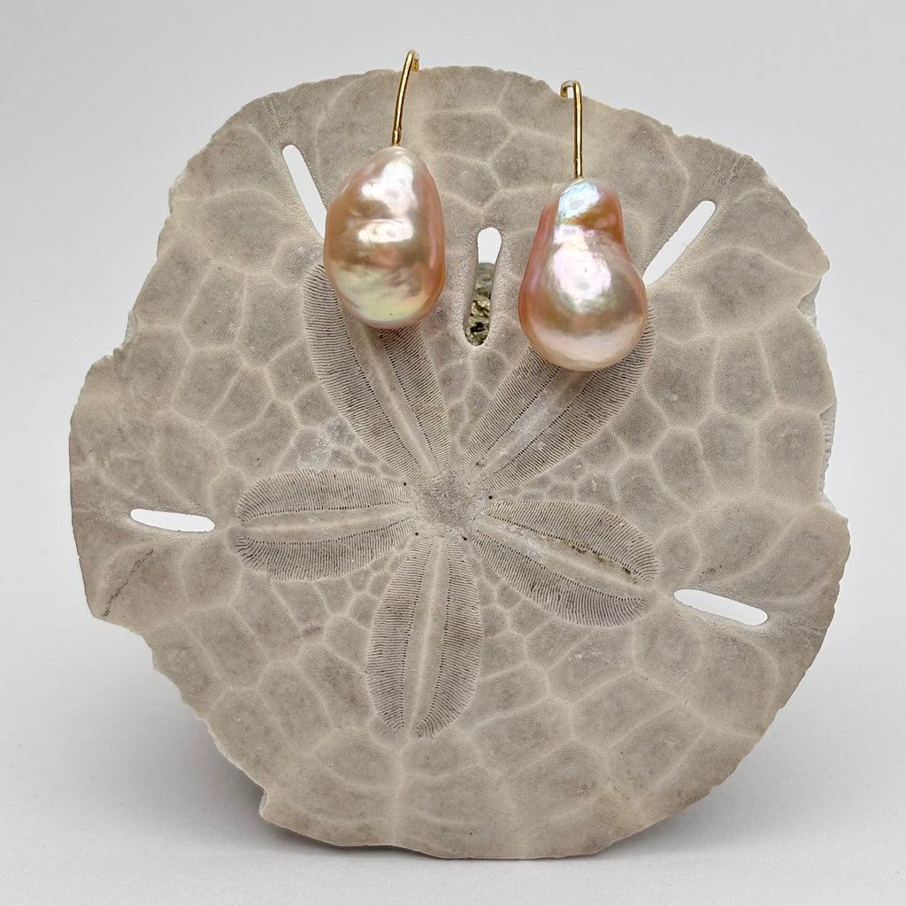 big baroque peach drop pearls on modern gold plated ear wires

