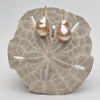 big baroque peach drop pearls on modern gold plated ear wires
