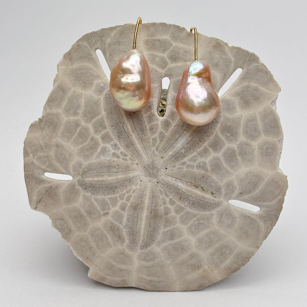 big baroque peach drop pearls on modern gold plated ear wires
