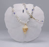 ✓ Stacked Chinese Freshwater pearl Necklace with Tanzanite and a Cone Shell