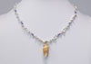 Chinese Freshwater keshi Necklace with Tanzanites and a Cone Shell