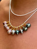 champagne pink near round pearl pendant