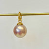 champagne pink near round pearl pendant