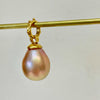 beautiful pink/peach drop pearl pendant