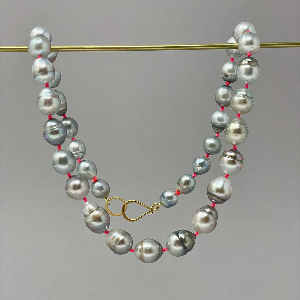 silver banded Tahitian pearls on neon knots