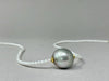 15mm silver Tahitian baroque pearl on tiny white shiny pearls