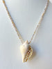 surprise seashell and lavender sapphire necklace