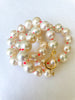 delightful funky white pearls on neon knots