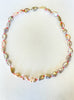 natural color keshi pearls on neon knots