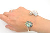 ✓ abalone and textured pearl sterling bangle