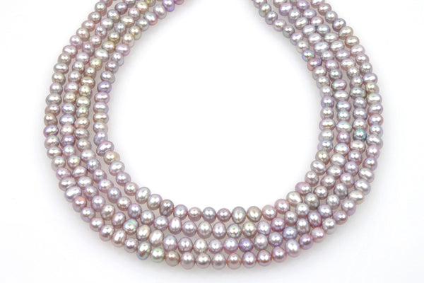 4 strand lot of purple oval pearls