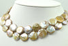 silver and bronze large coin pearl strands